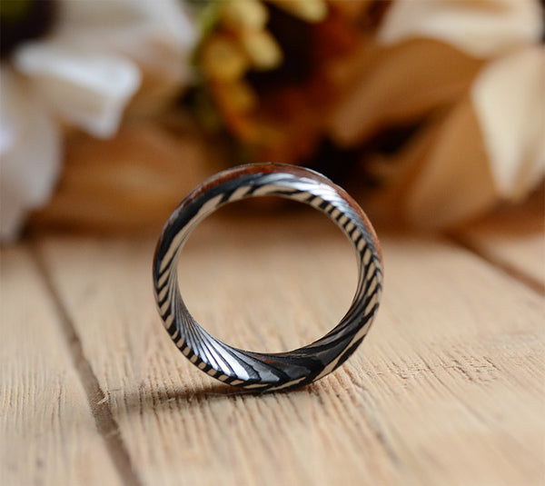 Match His and Hers Damascus Steel Pattern Wedding Band Sets with Koa Wood Inlay