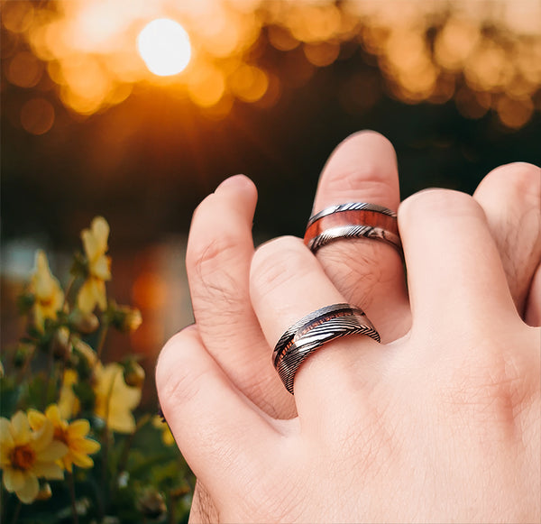 Match His and Hers Damascus Steel Pattern Wedding Band Sets with Koa Wood Inlay